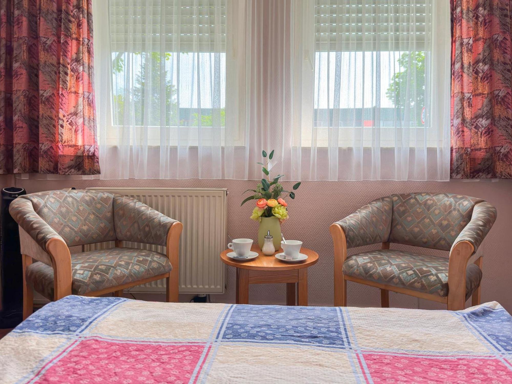 Doppel- oder Zweibettzimmer